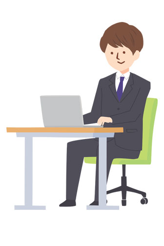 businessman sitting at a computer desk